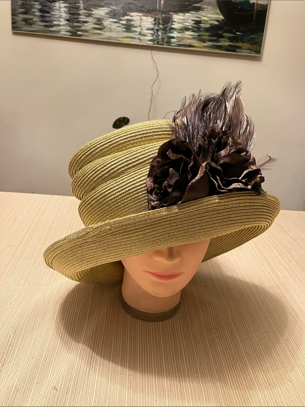Elegant Metallic Gold Hat with Brown Floral & Feather Accent